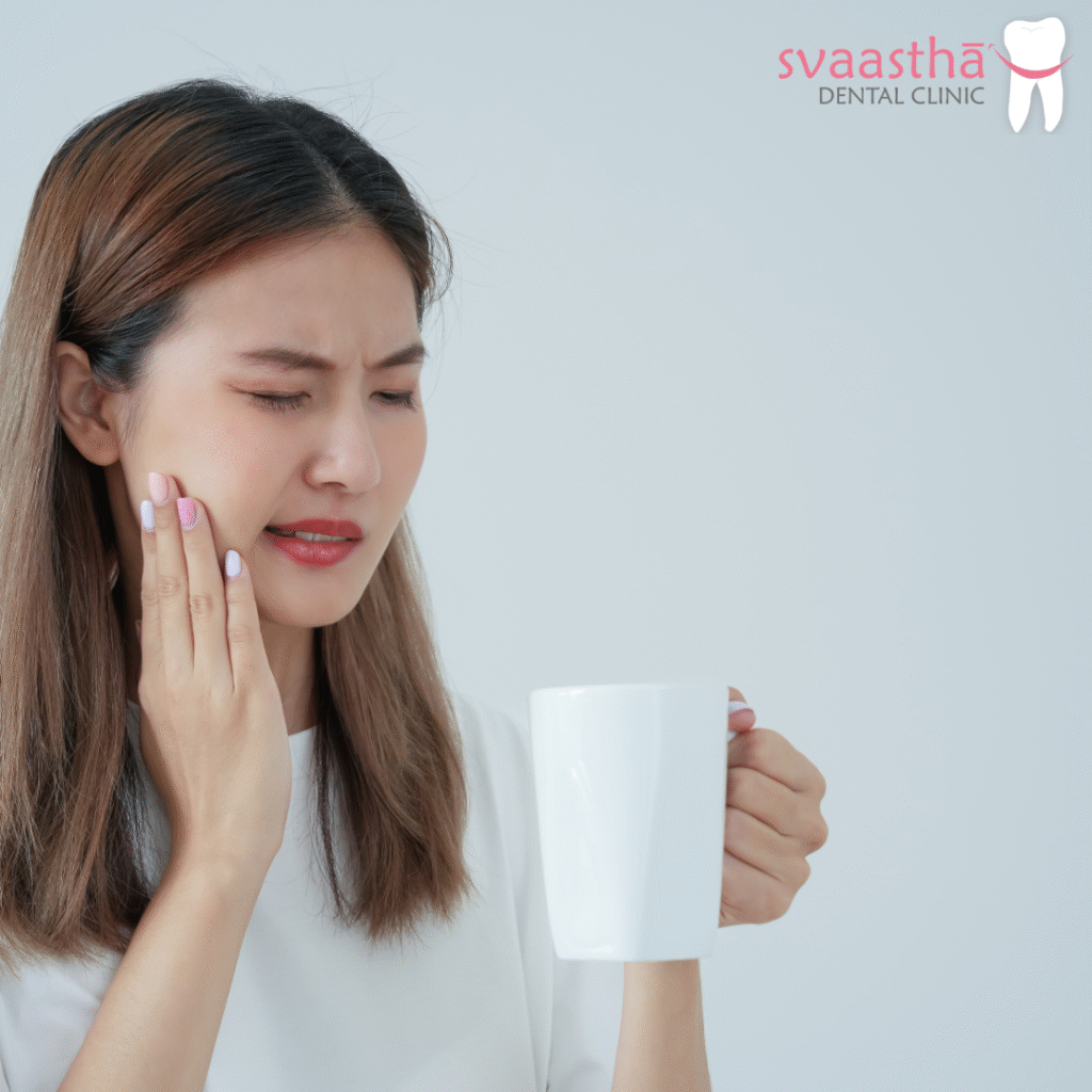 Image of a women professional having dental problem after drinking tea