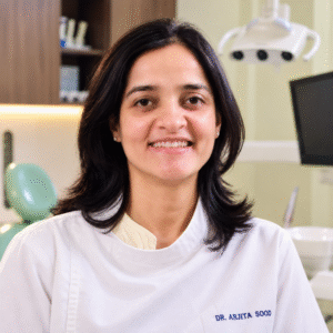 a head shot of dr arjita sood in her clinic